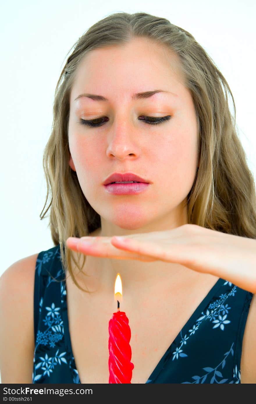 Nice young woman with a red candle. Nice young woman with a red candle