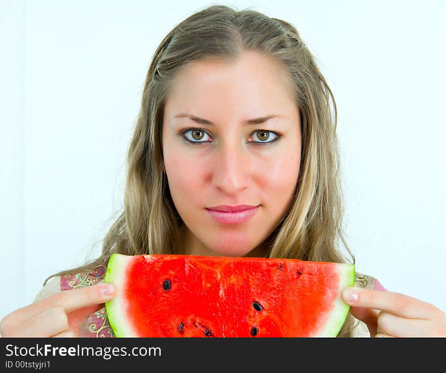 Lovely girl with red water-melon in her hands. Lovely girl with red water-melon in her hands