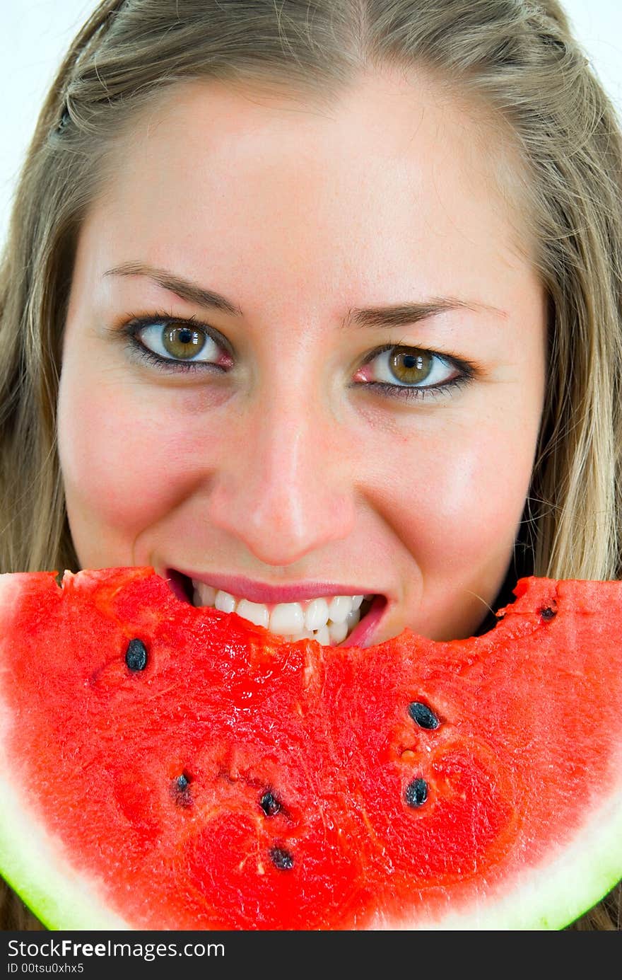 Portrait Of A Smiling Girl Eating A Water-melon