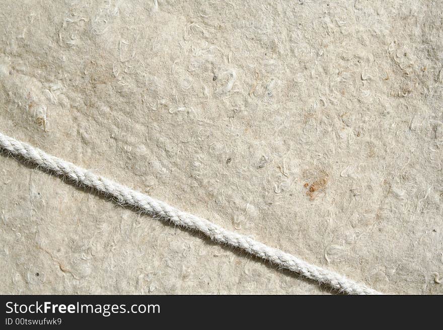 Background material of old wool carped with rope