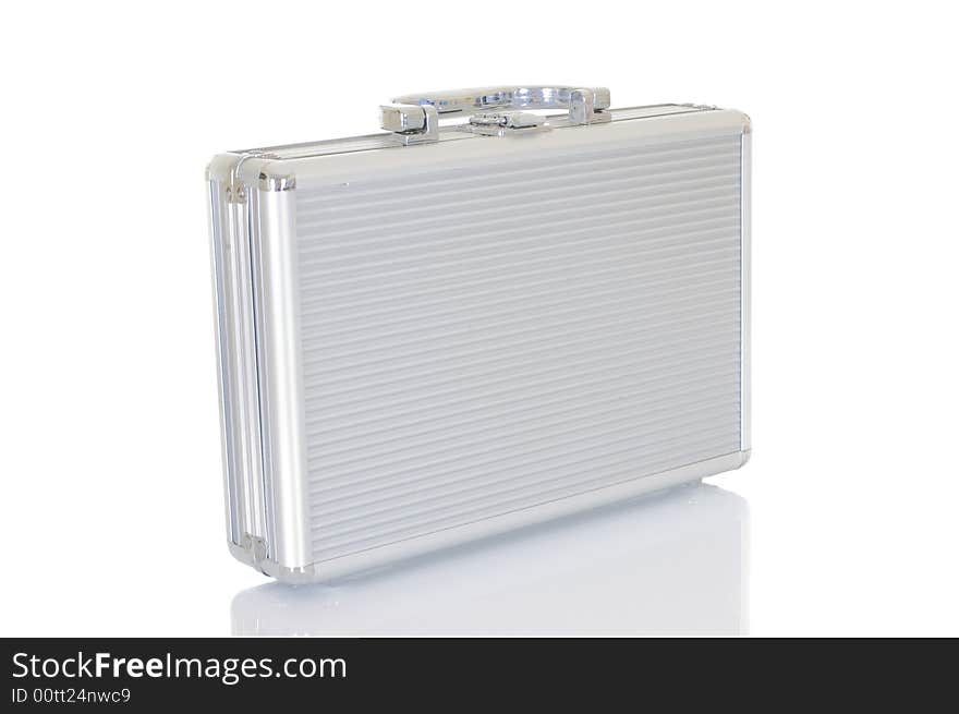 Metal case for cosmetics on white background , reflective surface