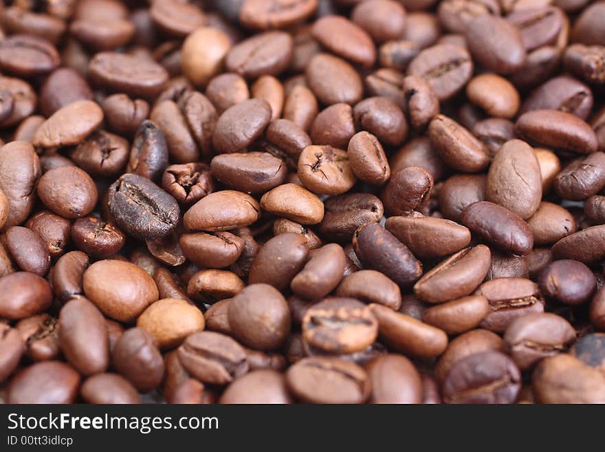 Dark rich coffee beans background