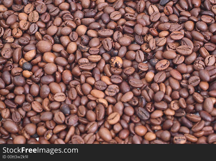 Dark rich coffee beans background