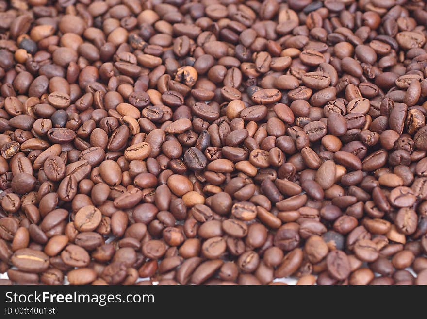 Dark rich coffee beans background