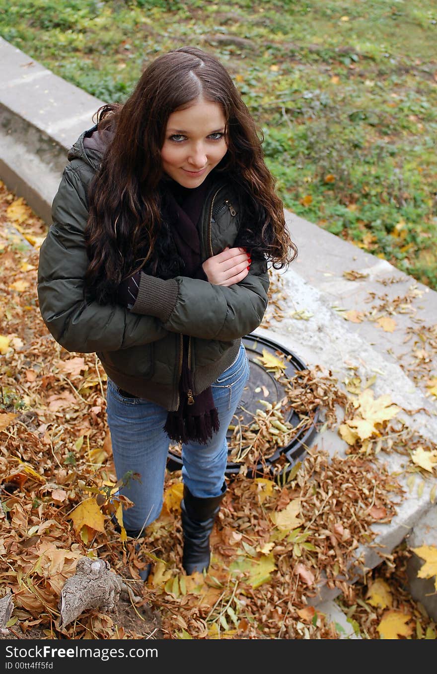 Beautiful teenage girl in the autumn park. Beautiful teenage girl in the autumn park