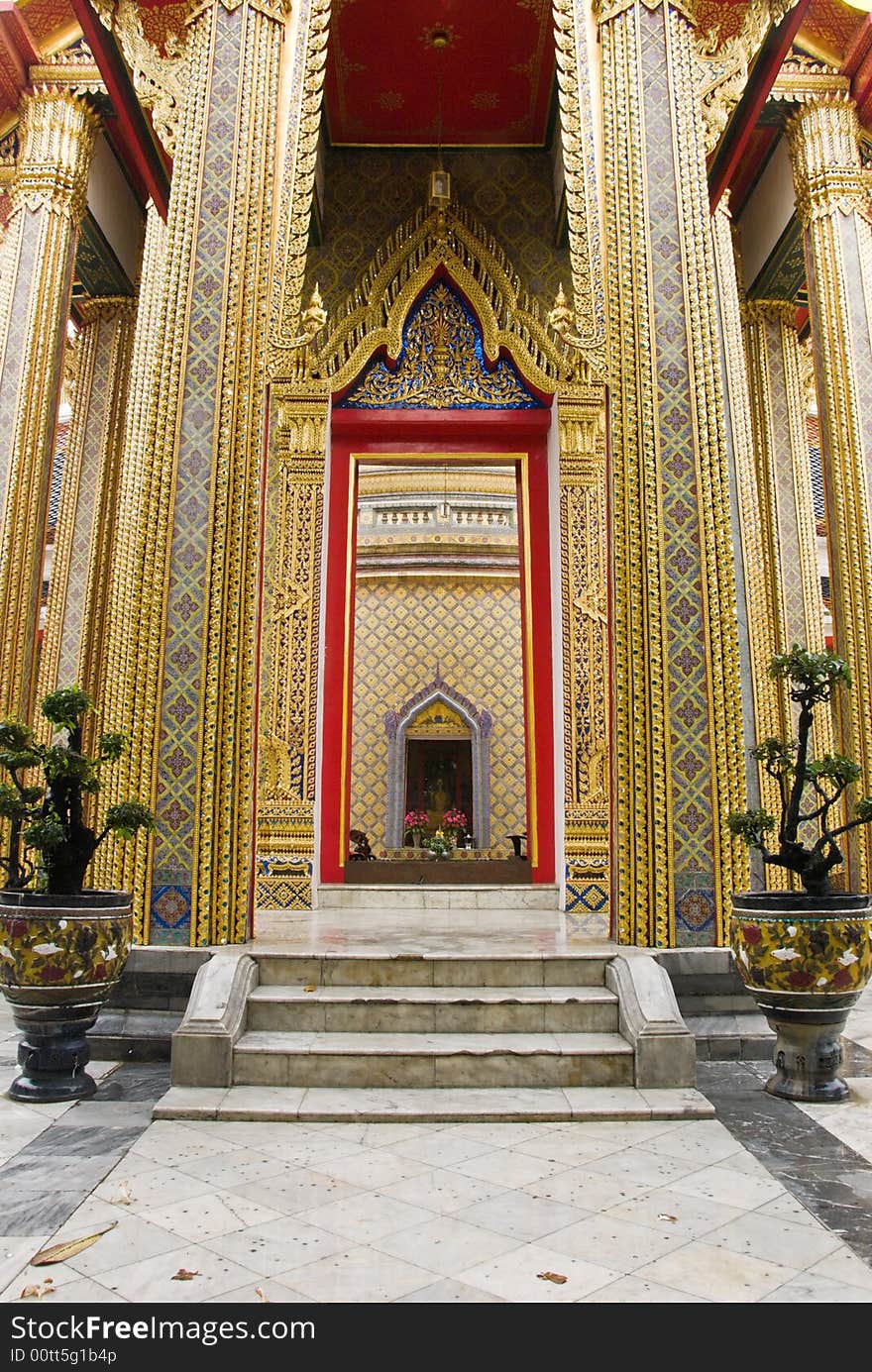 Buddhist temple with golden decorated walls