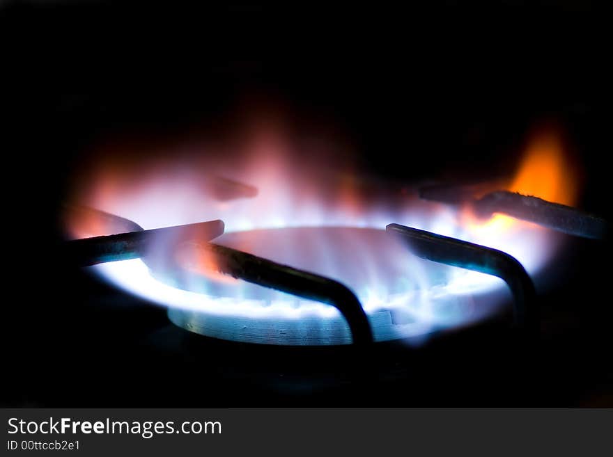 Natural gas burner with flame isolated on black background. Natural gas burner with flame isolated on black background