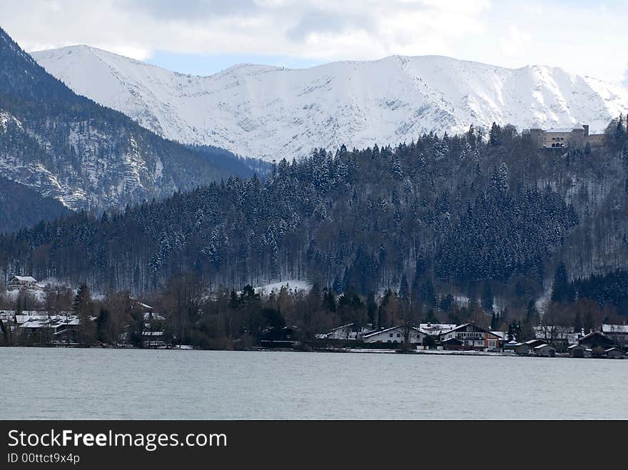 Rock wall in the ice and snow in the Bavarian Alps