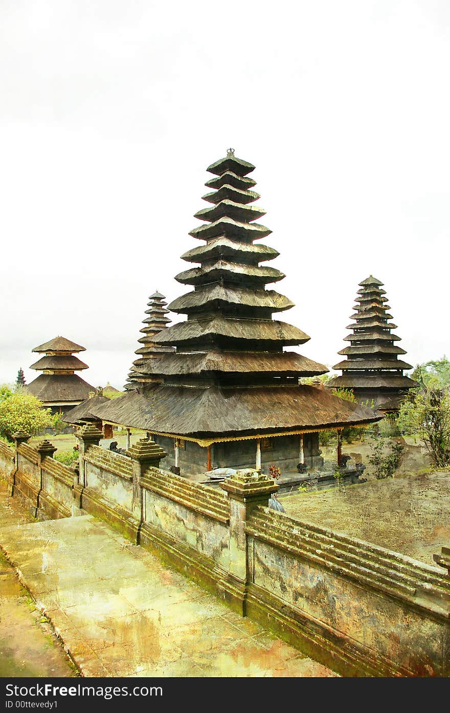 Ancient Balinese temple - toned picture in painting style. Ancient Balinese temple - toned picture in painting style