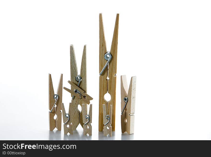 A wooden clothespin family (2 parents and 6 children). A wooden clothespin family (2 parents and 6 children)