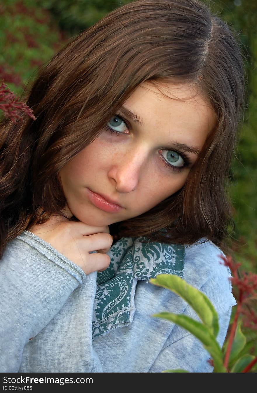 Teenage girl in high grass alone