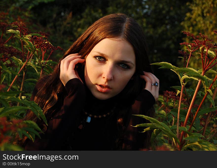 Teenage girl in high grass alone