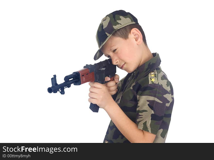 Young boy hold gun isolated on white background