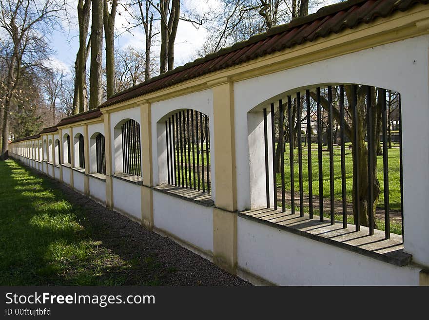 The wall with bars in the park