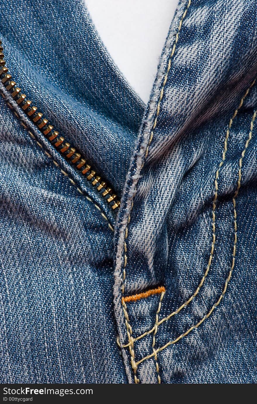 Blue jeans unzipped close-up photo