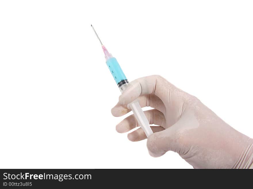 Hand with a syringe isolated on white. Hand with a syringe isolated on white