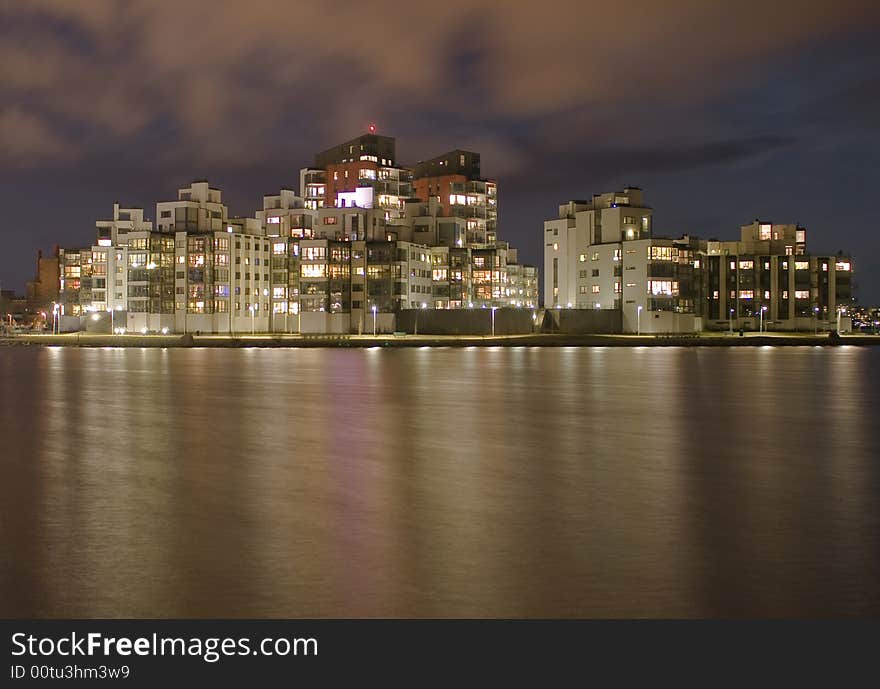 Night view of houses by the sea