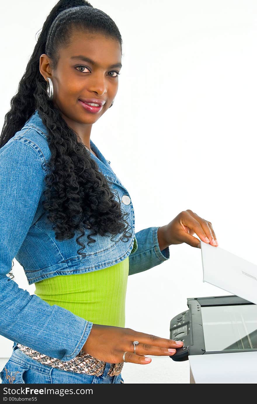 Nice office girl operating a scanner