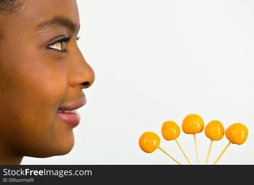 African Girl With Yellow Tropical Fruits