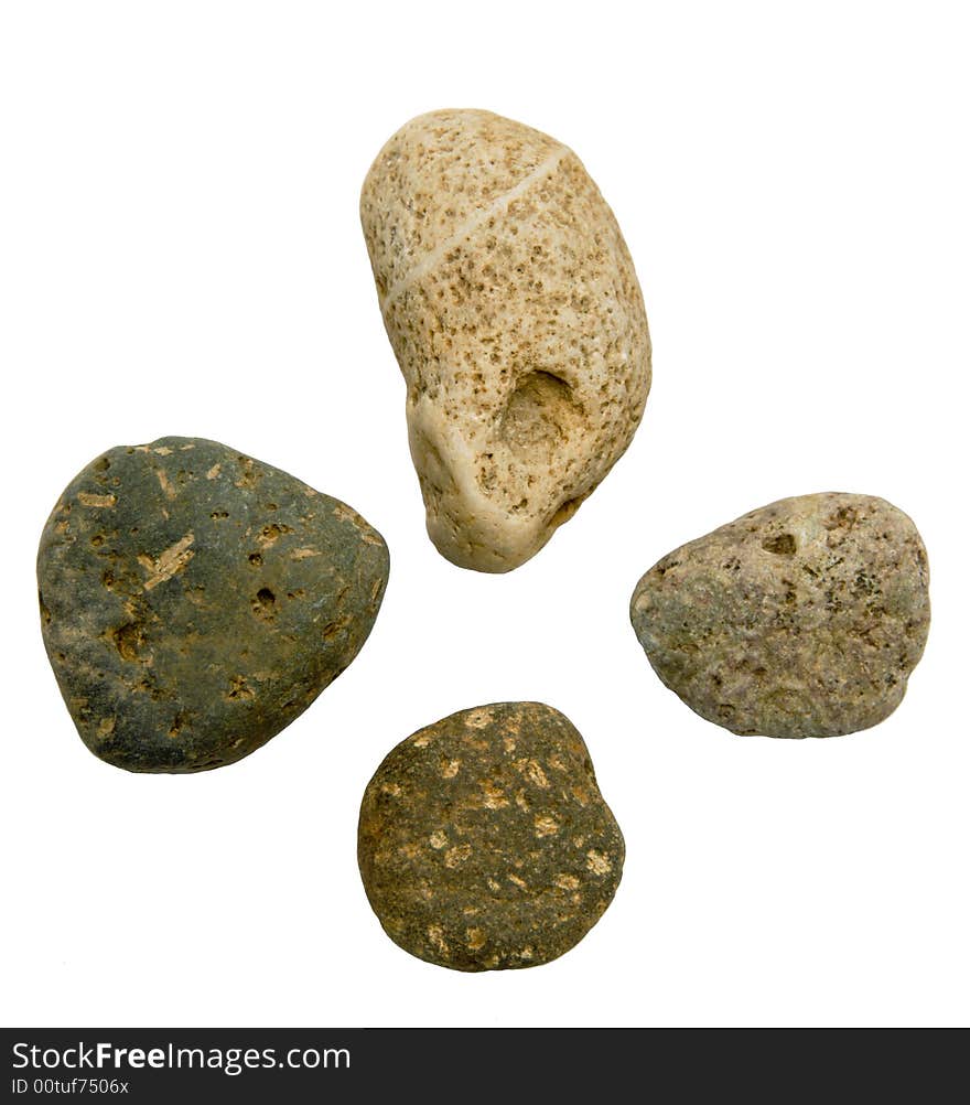 Four stones on a white background.