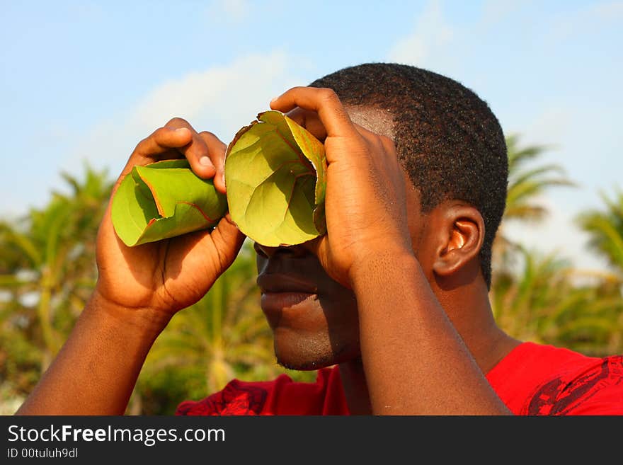 Man looking through binoculars