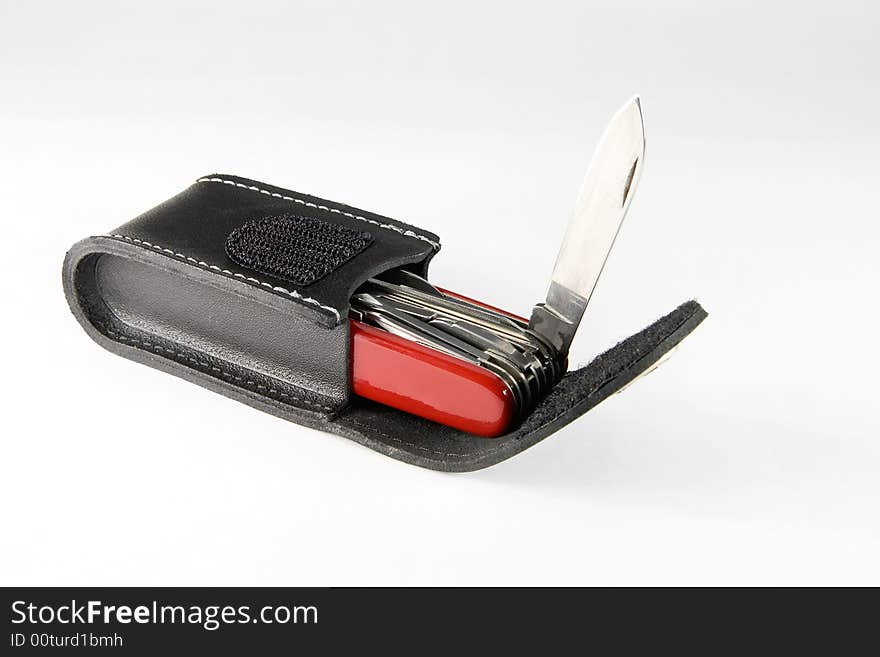 Pocket swiss army knife on white background