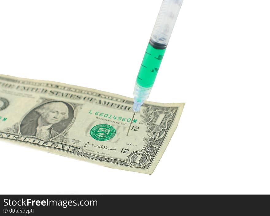 US one dollar bill with syringe needle sticking in it on white background. US one dollar bill with syringe needle sticking in it on white background