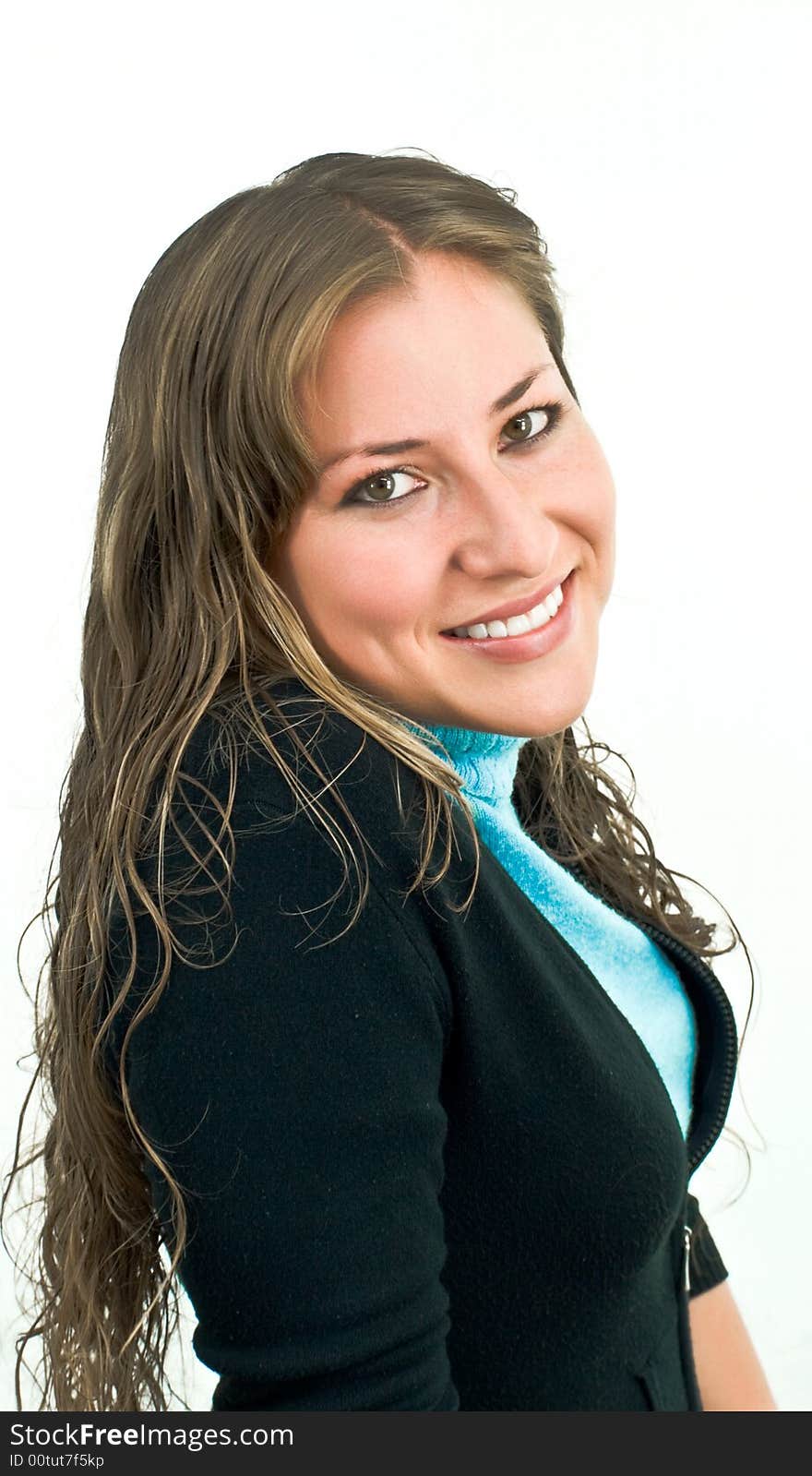 Smiling young woman turning to camera