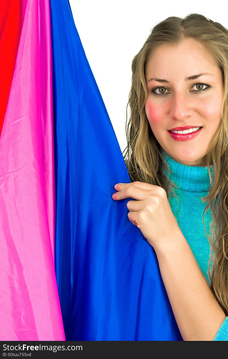 Joyfully smiling young woman with a blue-red and purple flag