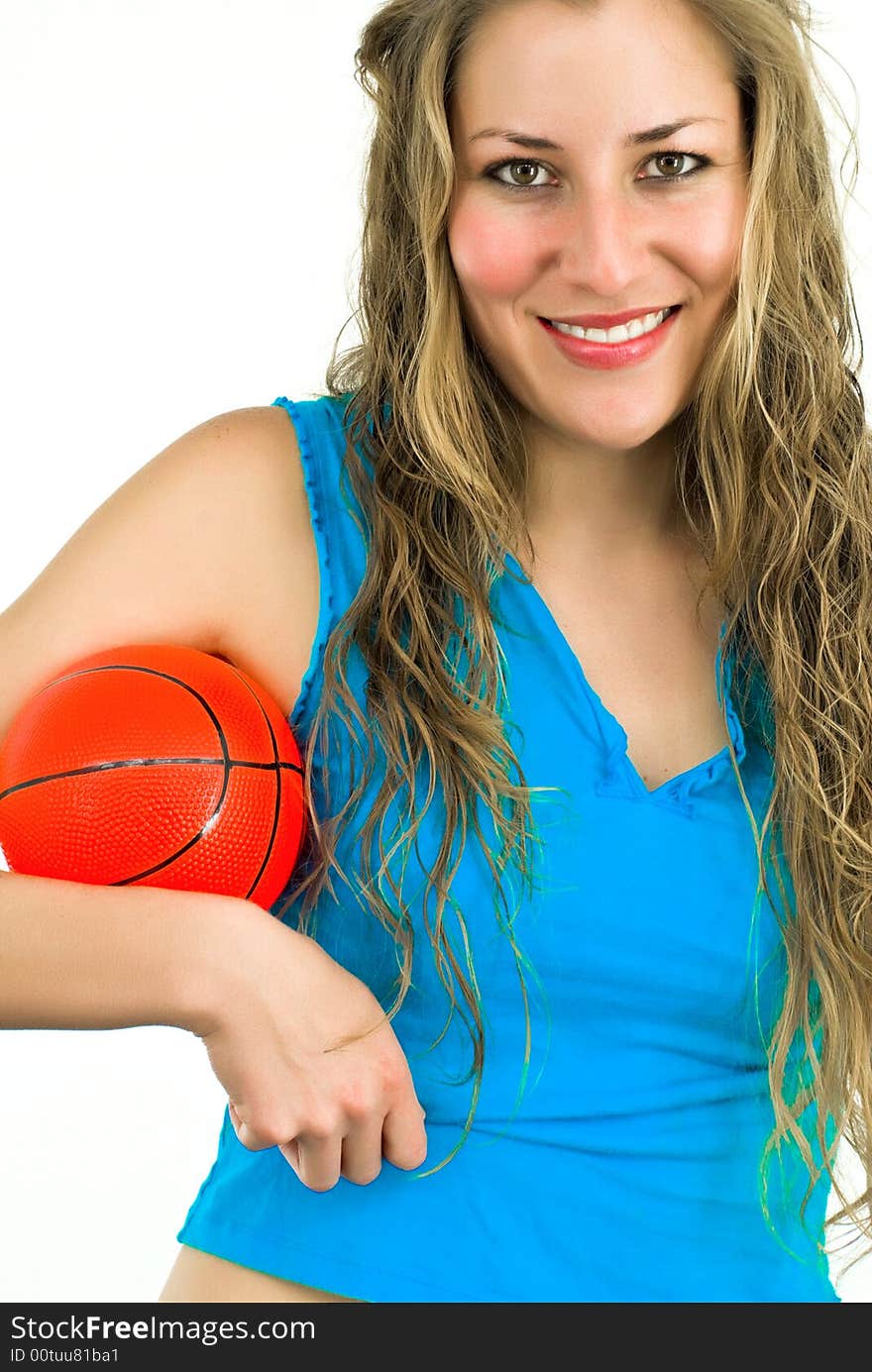 Smiling lady in blue with a small red ball in hands. Smiling lady in blue with a small red ball in hands