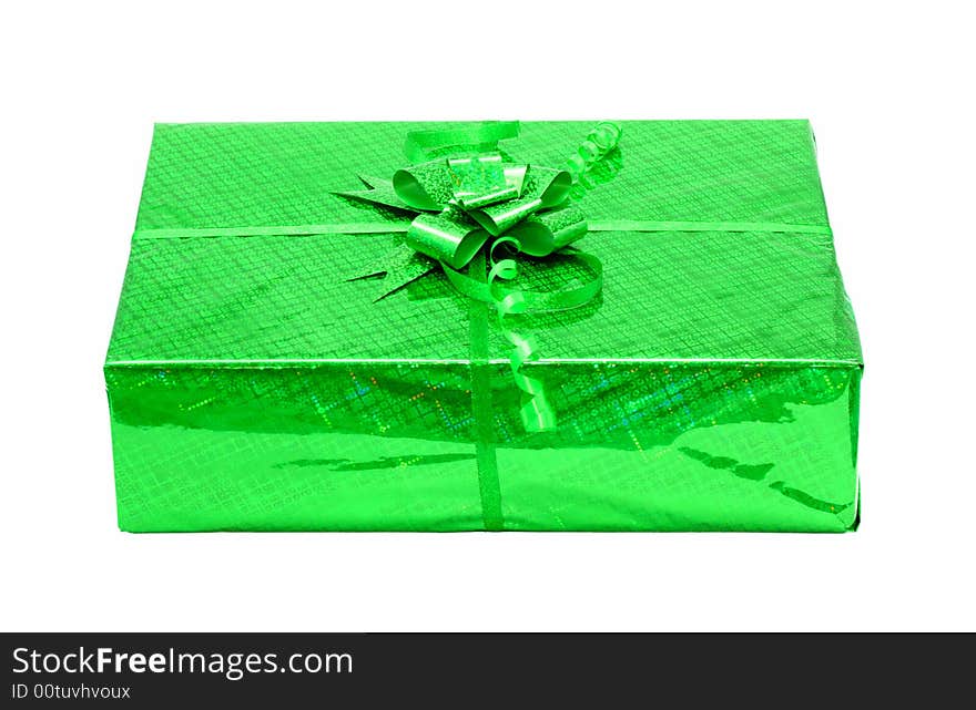 Green celebratory gift box isolated on white