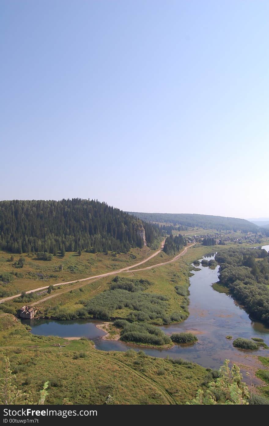 Hight mountains on small river. Hight mountains on small river