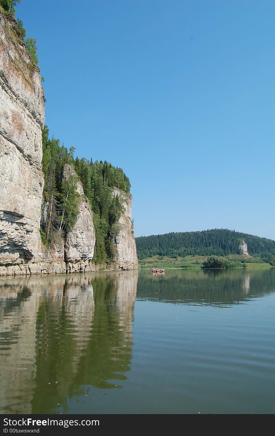 Hight mountains on small river. Hight mountains on small river