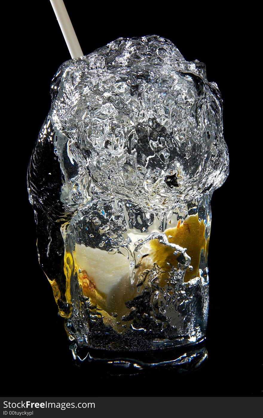 Water flows from a glass. Water flows from a glass