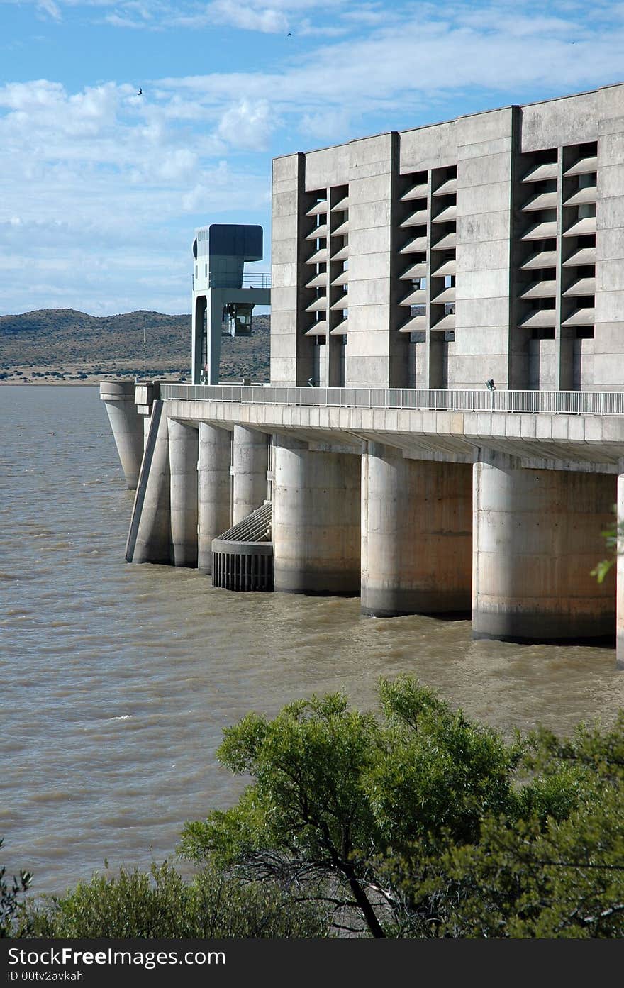 A large concrete dam wall, photographed in South Africa.