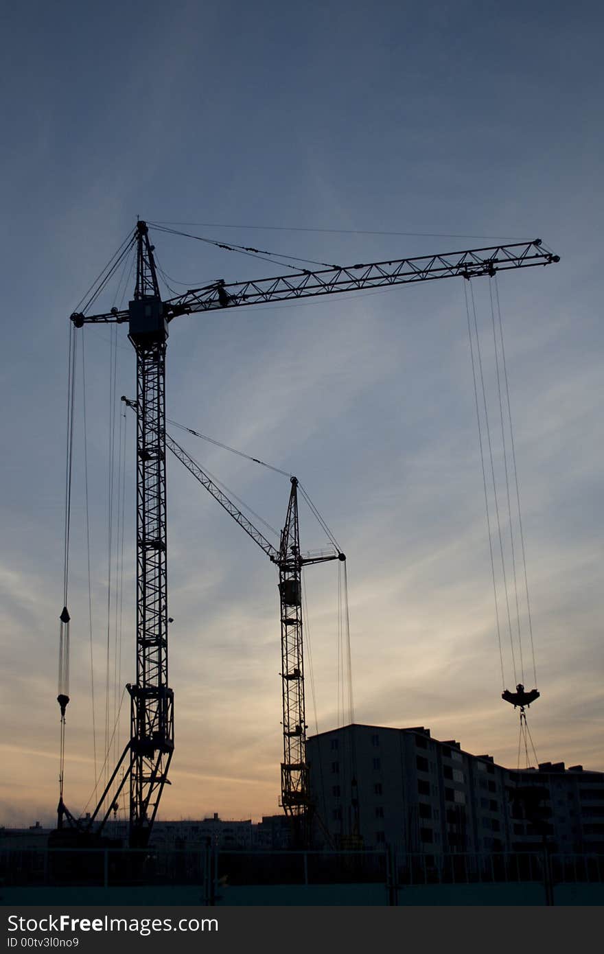 Silhouette of the building crane. Silhouette of the building crane