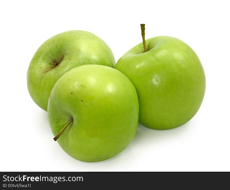 Three green apples isolated on white background