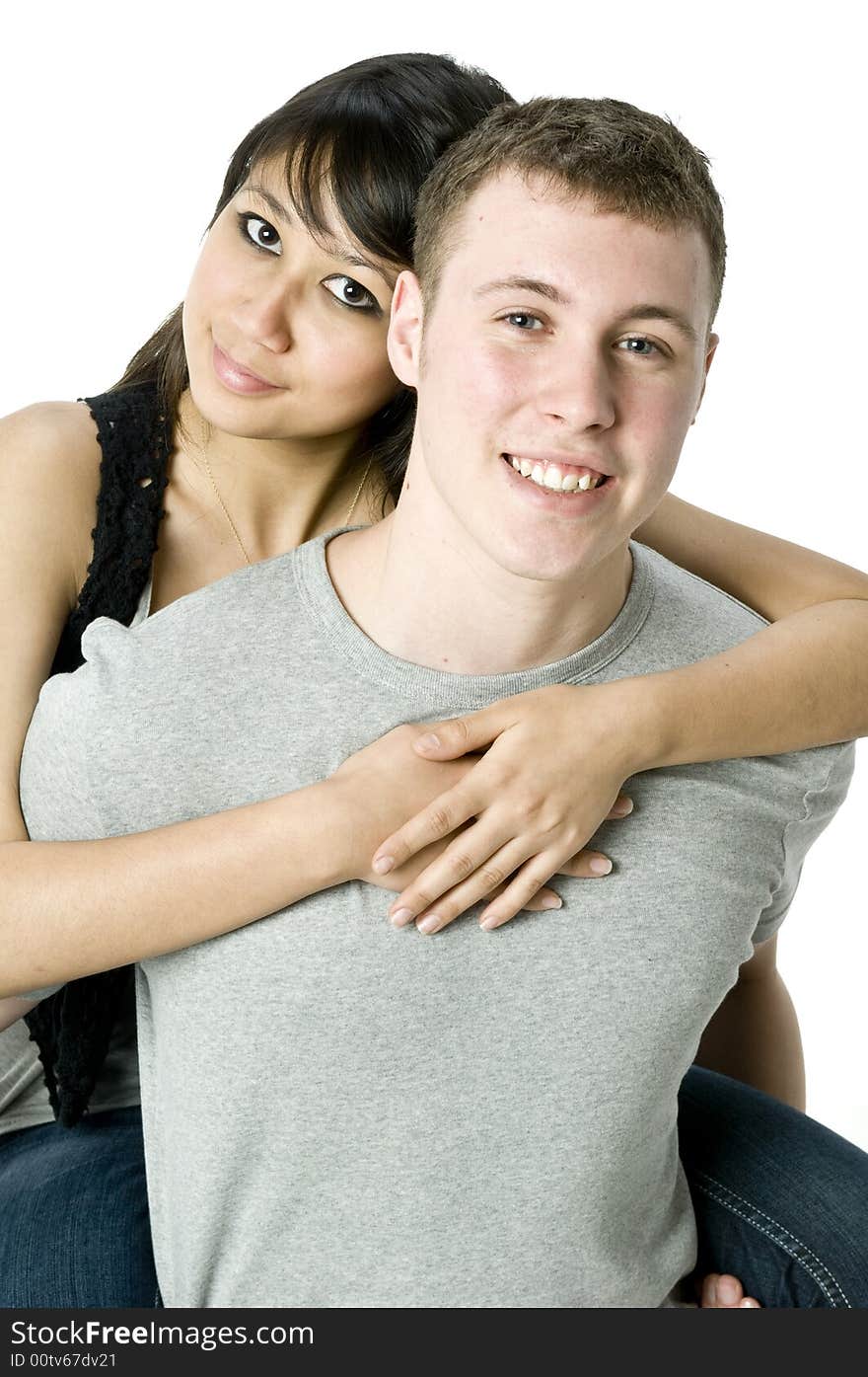 A young couple in love having a piggyback ride. A young couple in love having a piggyback ride