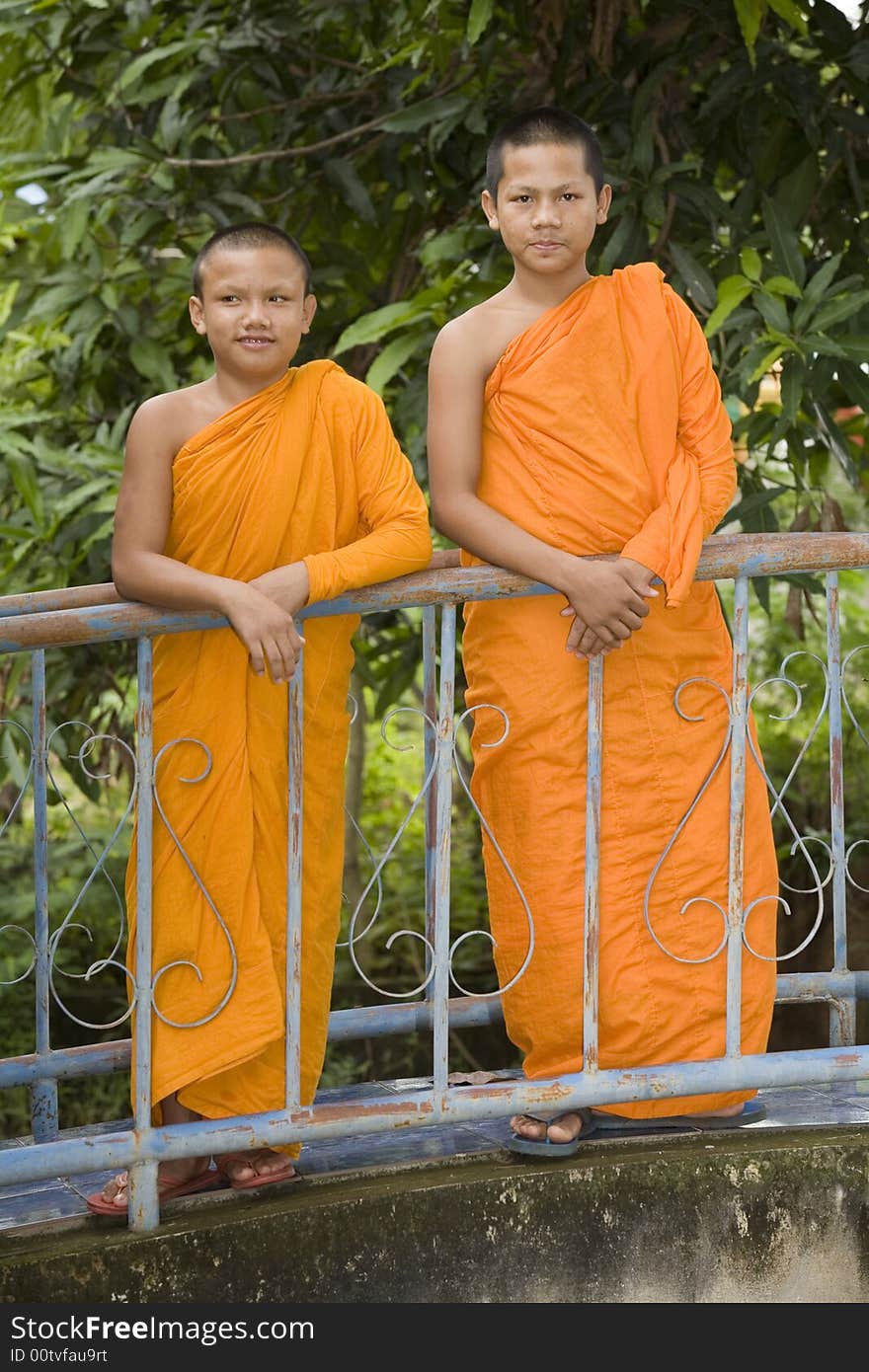 Buddhist monk from Thailand in traditional orange garb