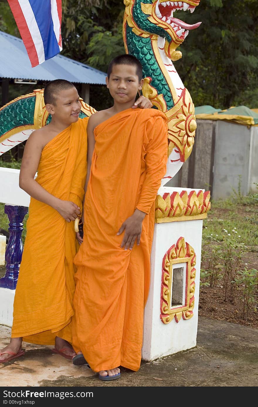 Buddhist monk from Thailand in traditional orange garb