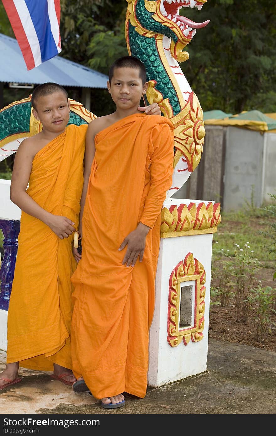 Buddhist monk from Thailand in traditional orange garb