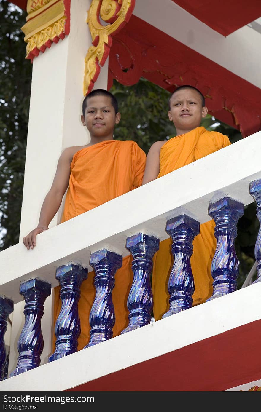 Buddhist monk from Thailand in traditional orange garb