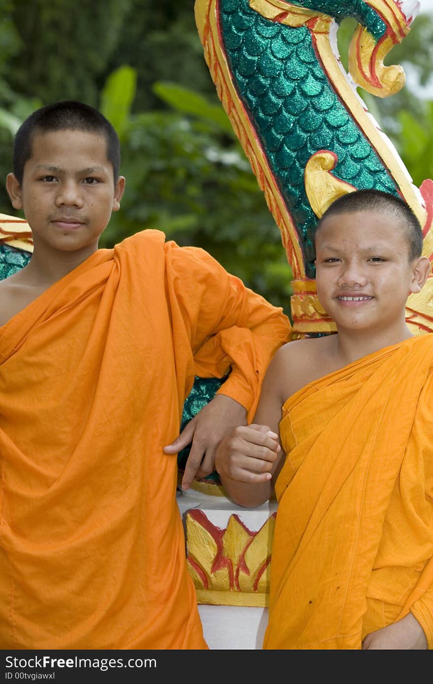 Buddhist monk from Thailand in traditional orange garb