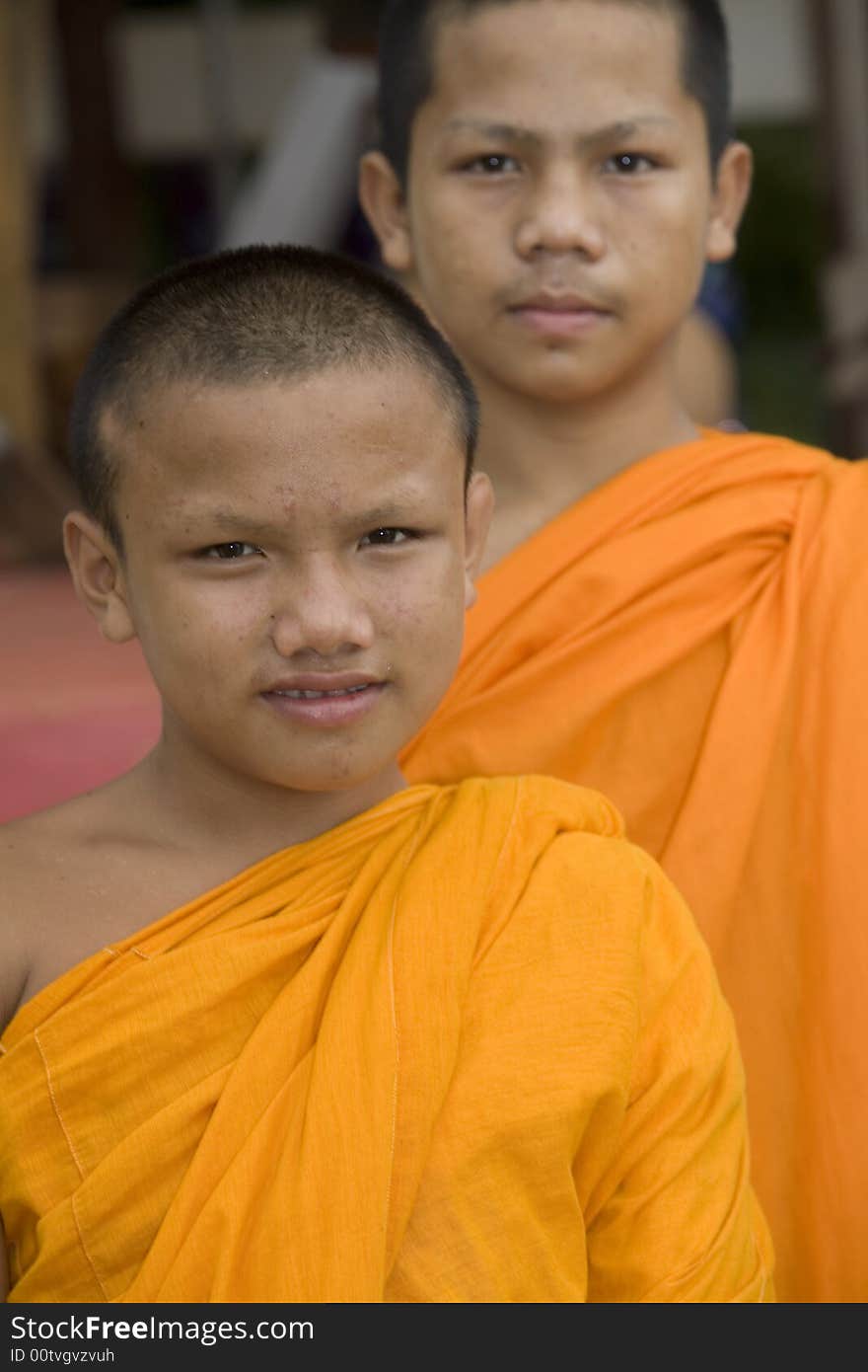 Buddhist monk from Thailand in traditional orange garb