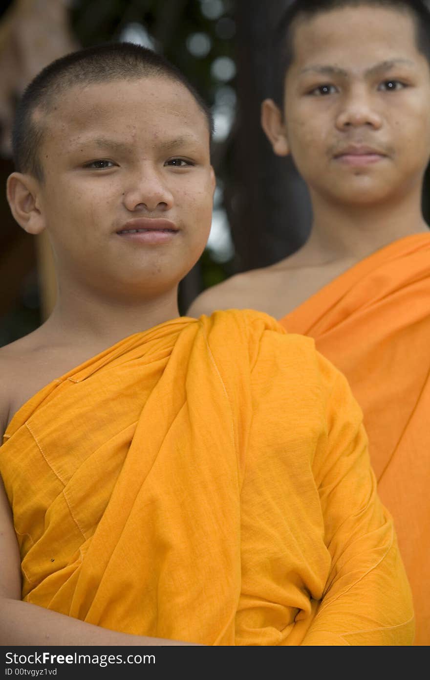 Buddhist monk from Thailand in traditional orange garb