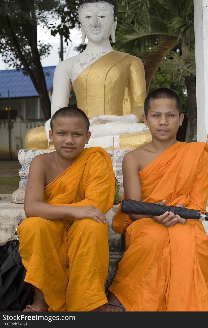 Buddhist monk from Thailand in traditional orange garb