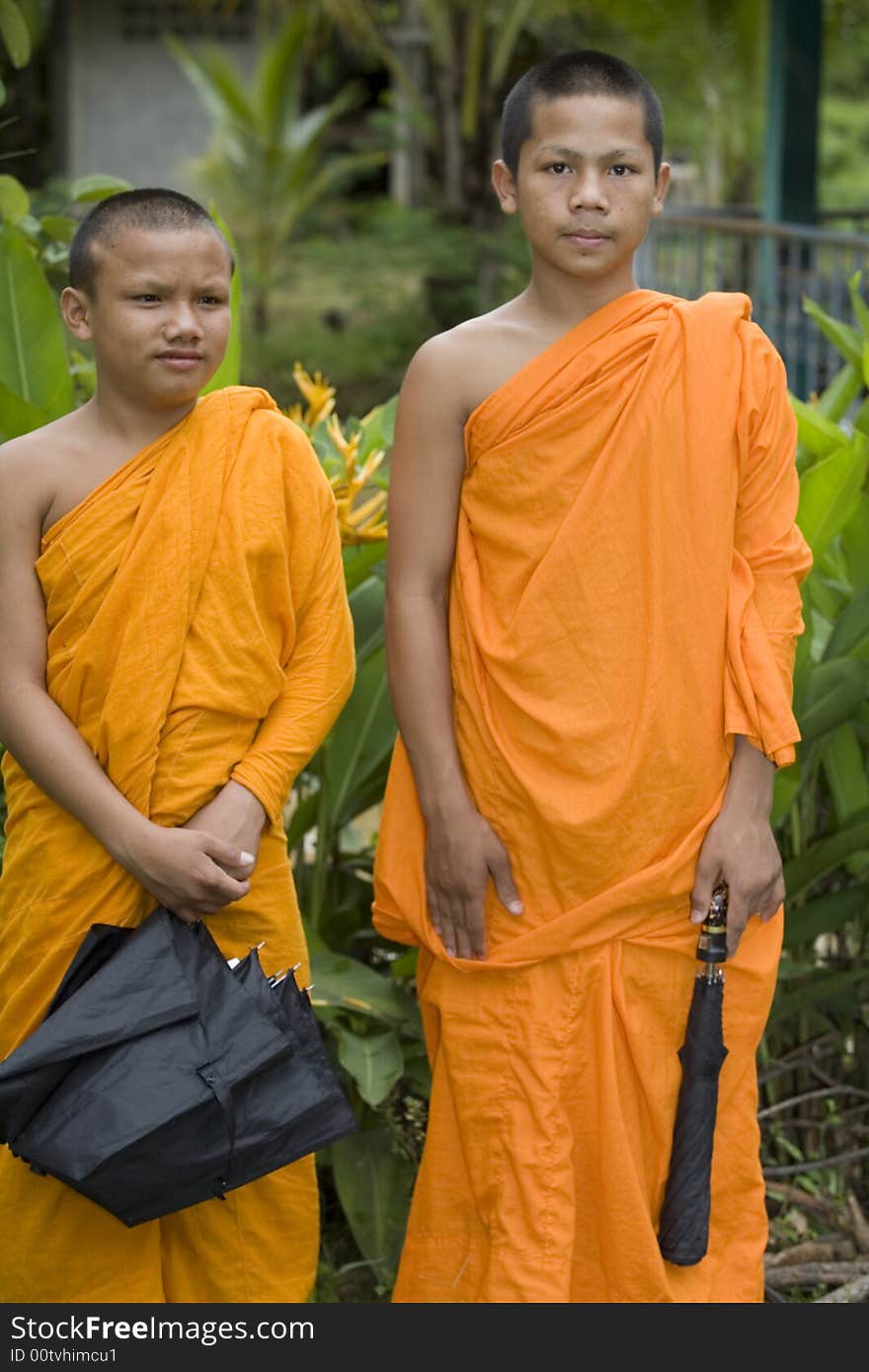 Buddhist monk from Thailand in traditional orange garb