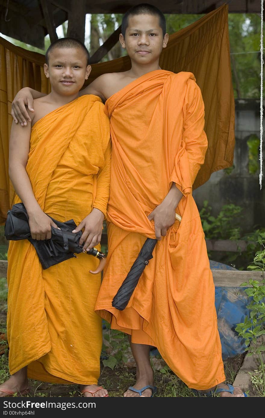 Buddhist monk from Thailand in traditional orange garb