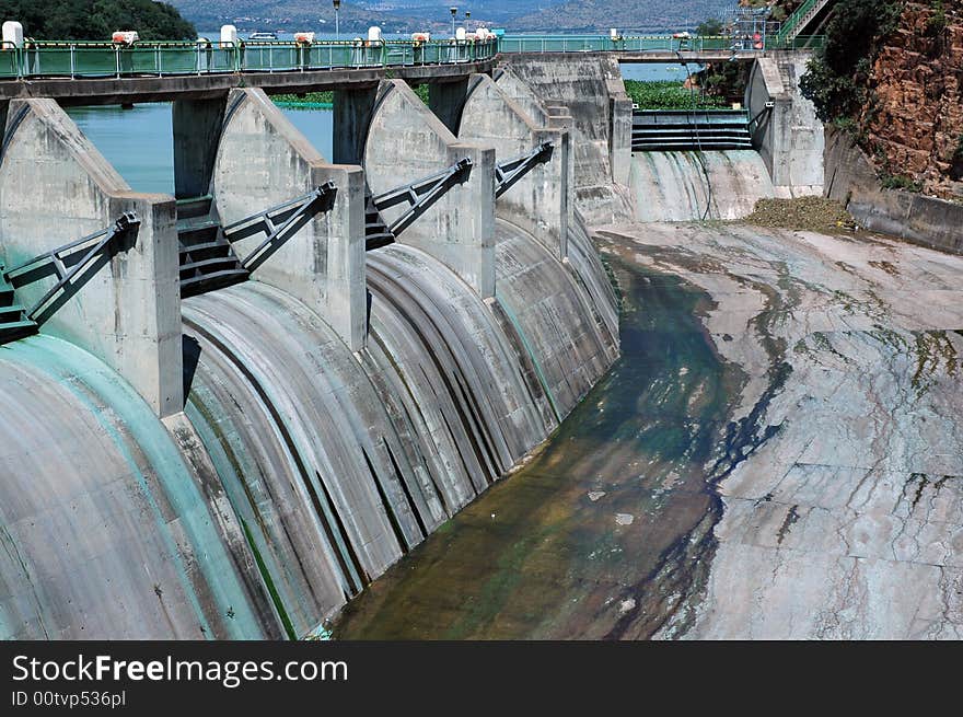 A large concrete dam wall, photographed in South Africa.