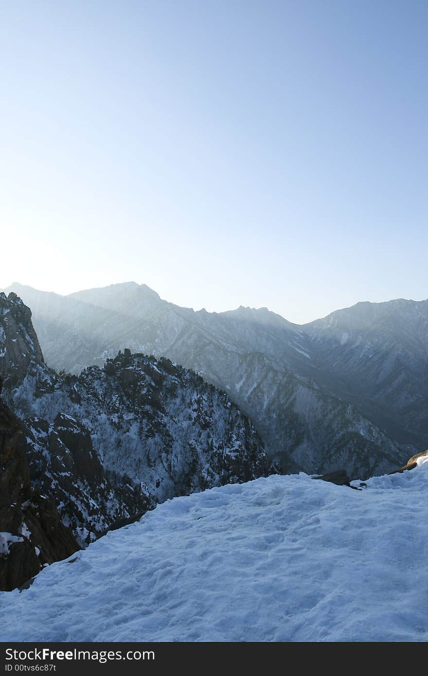 This picture is taken on a mountain top in south korea when the sun is rising above the mountain range. The temperate at that time is -10c. This picture is taken on a mountain top in south korea when the sun is rising above the mountain range. The temperate at that time is -10c